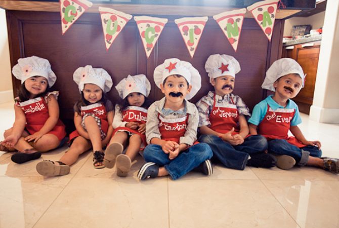 Crianças em festa infantil com tema pizza